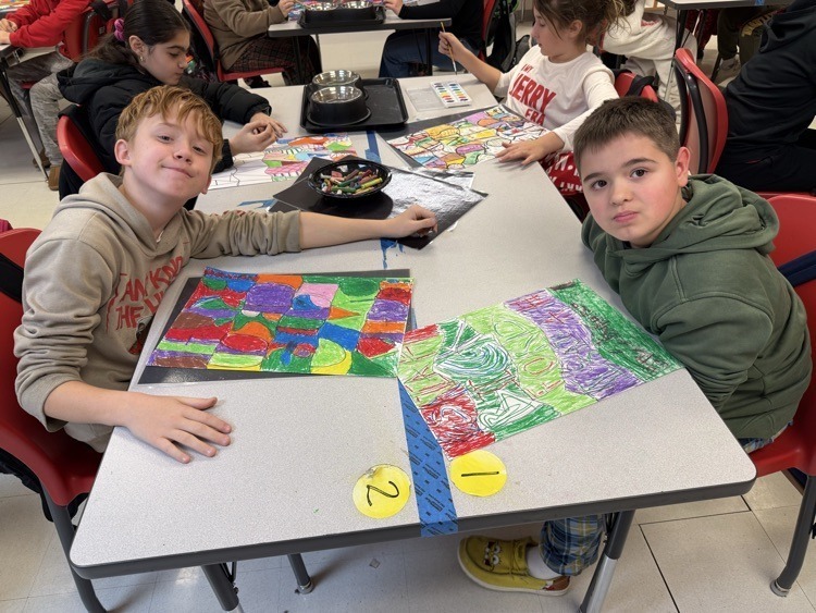 Catalayah students working on art pieces based on their name.