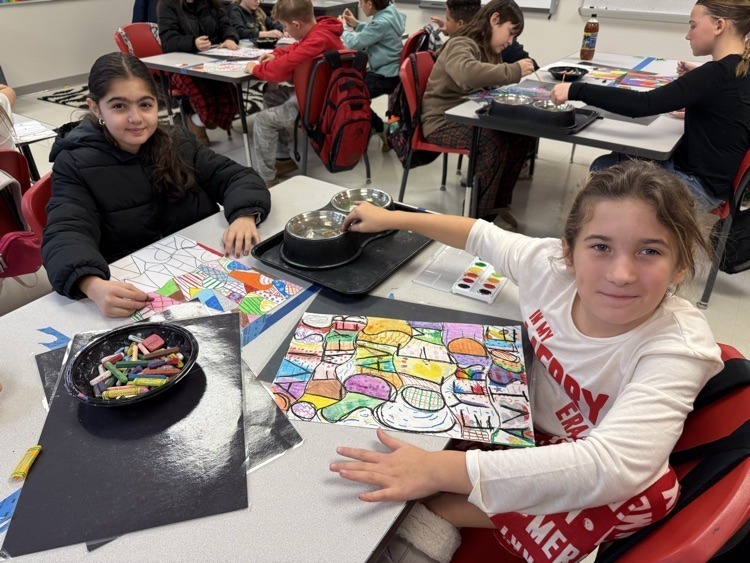 Catalayah students working on art pieces based on their name.