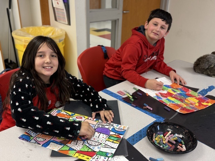 Catalayah students working on art pieces based on their name.