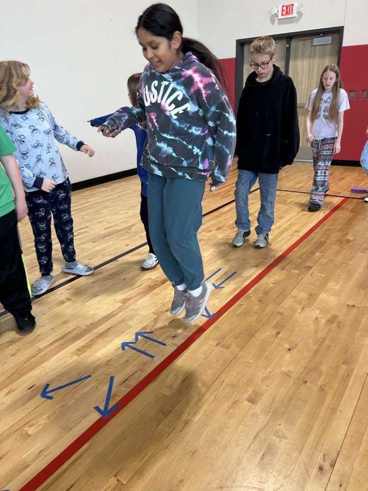 Claremont student working through an obstacle course. 