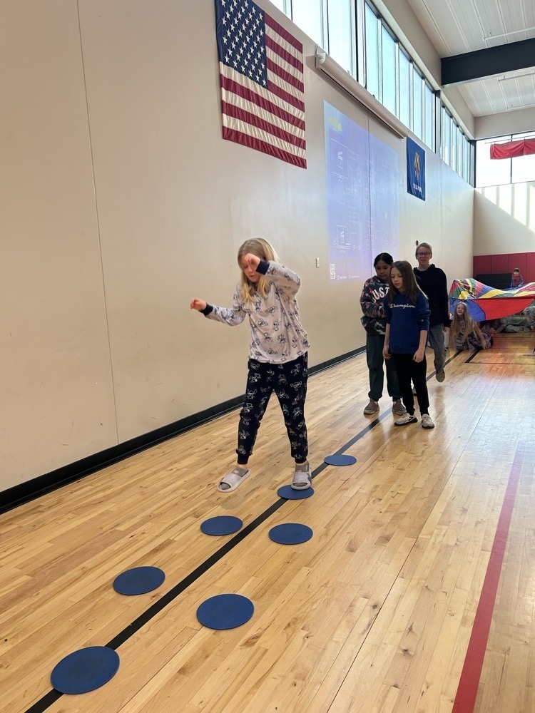Claremont student working through an obstacle course. 