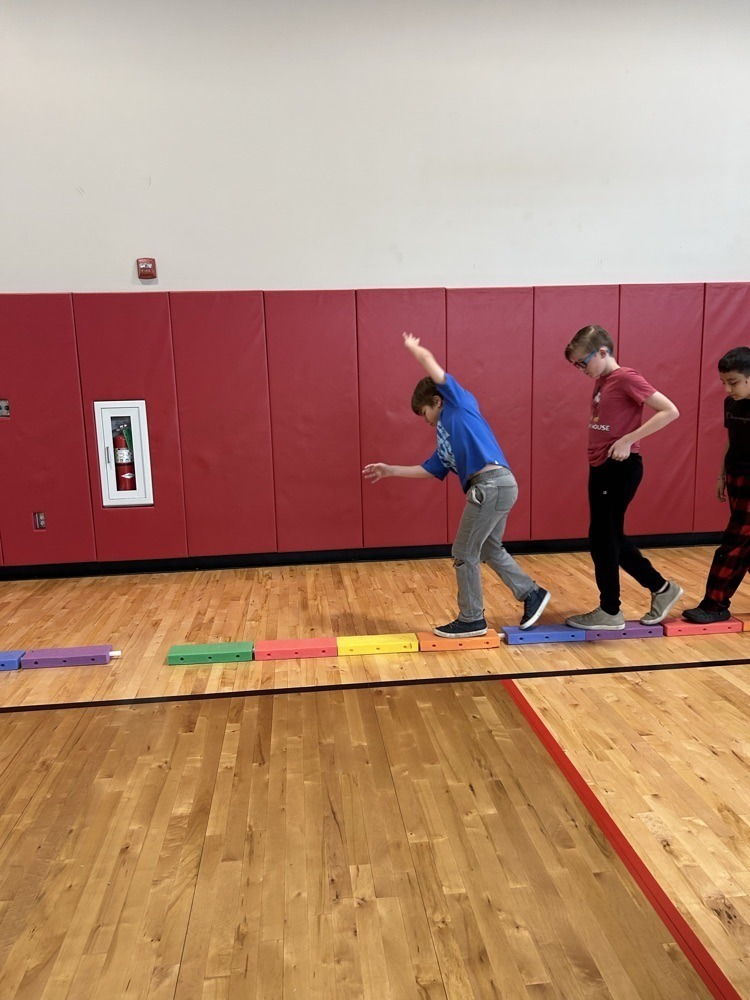 Claremont student working through an obstacle course. 