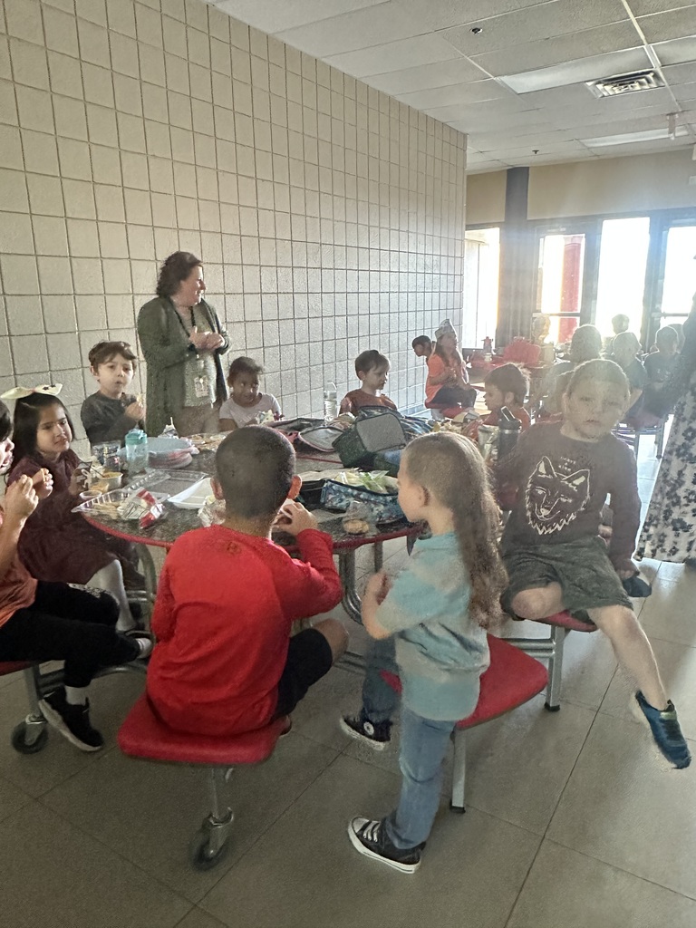 students smiling at lunch