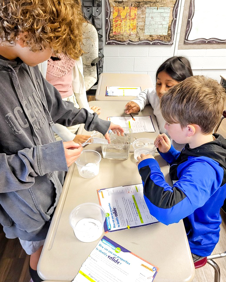 Claremont fifth graders practicing sequential writing