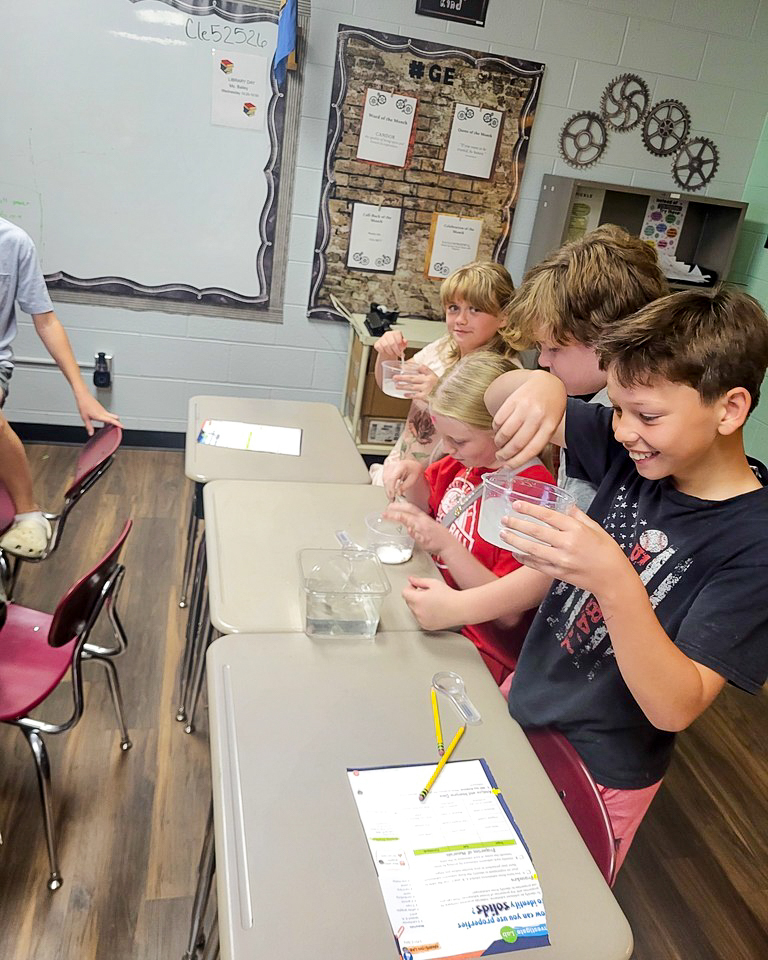 Claremont fifth graders practicing sequential writing