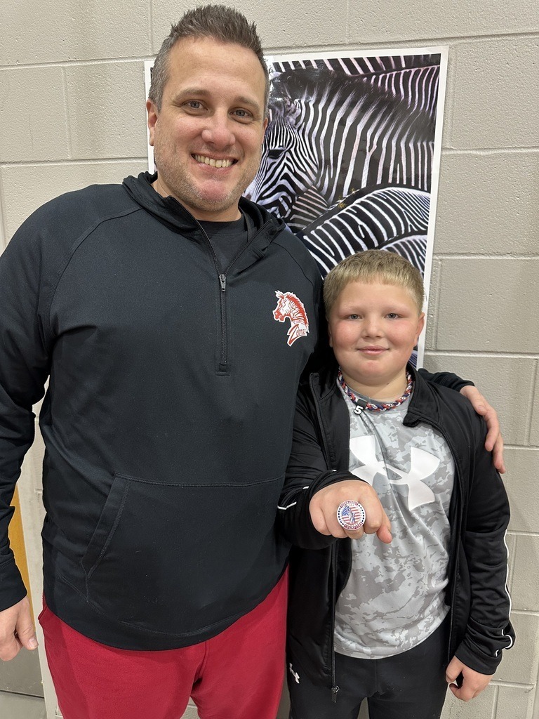 Mr. Hughes with Free Throw Contest winner.