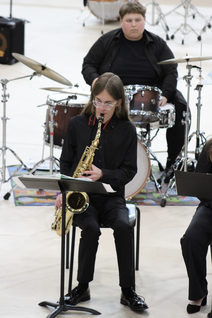 Student playing saxophone at Verdigris Jazz festival