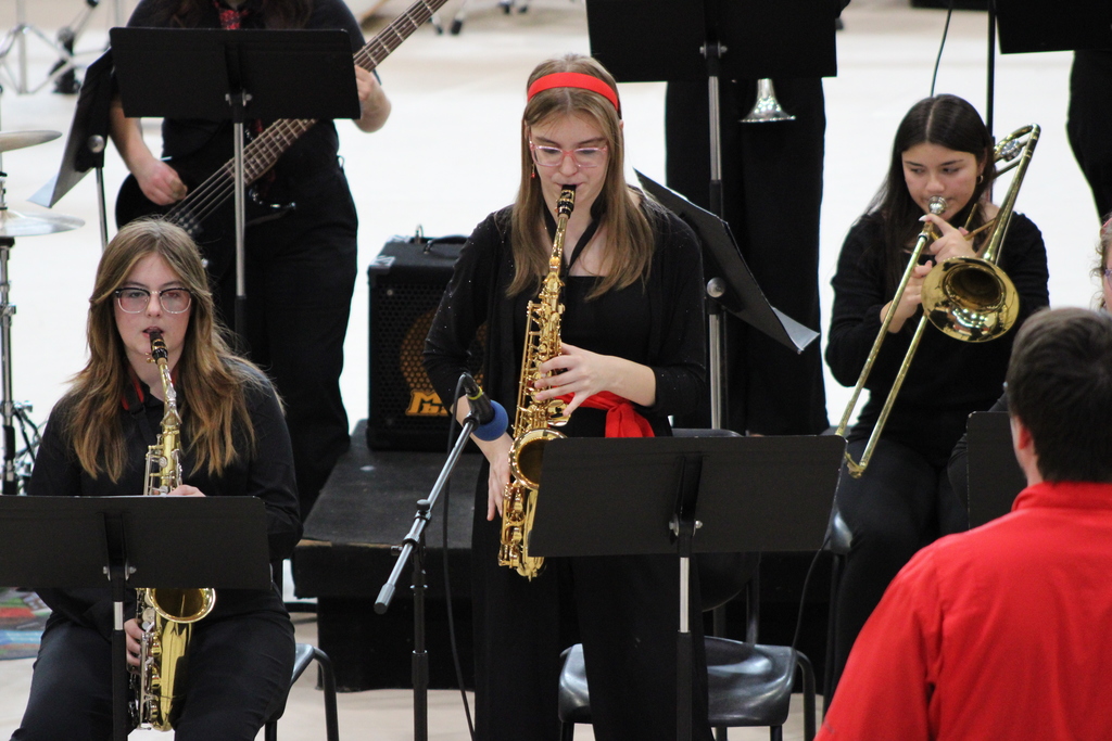 Student playing saxophone solo at contest