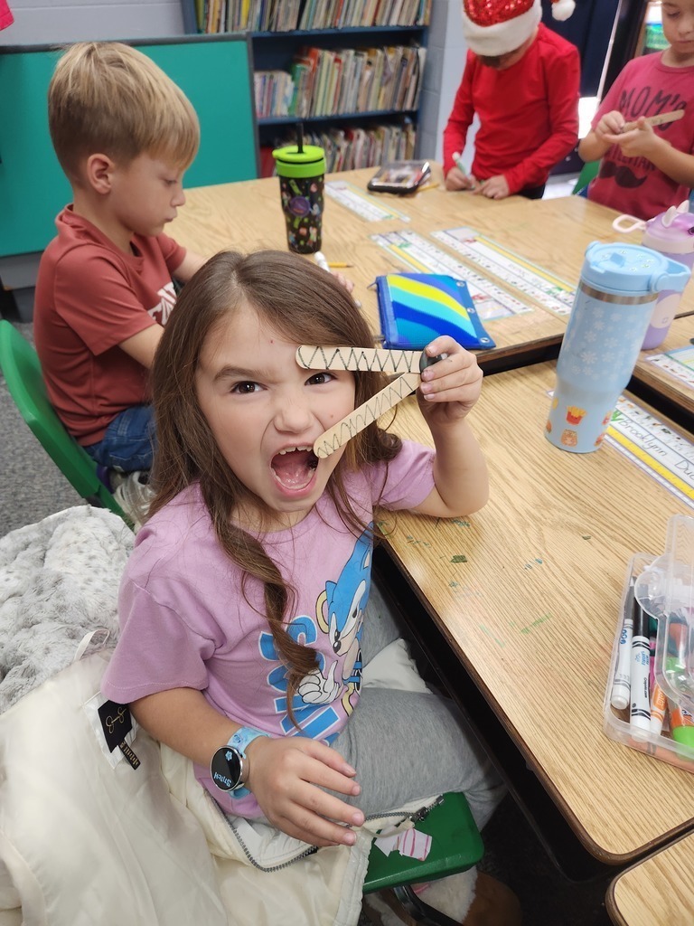 Claremont students learning less than, greater than, and equal to.