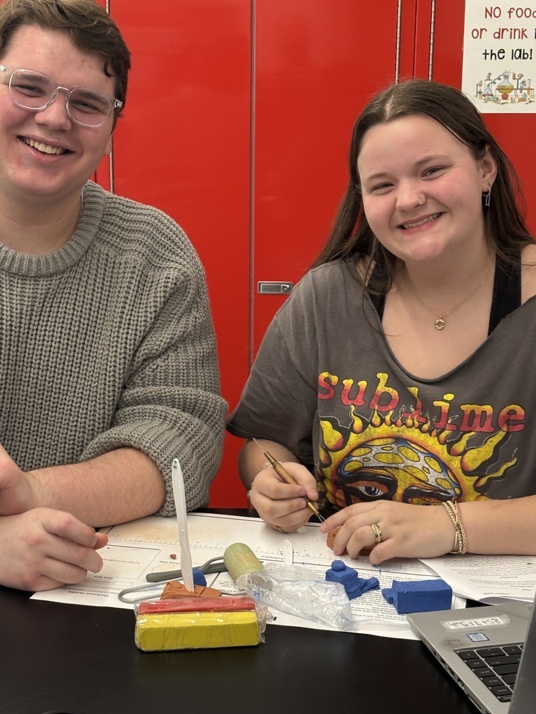 high school Biomedical Capstone students building anatomically correct, functioning heart models out of clay.