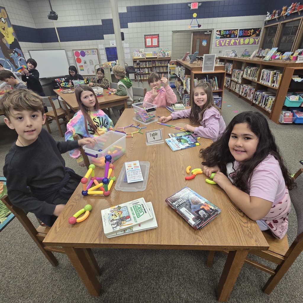 students building a machine to make it snow