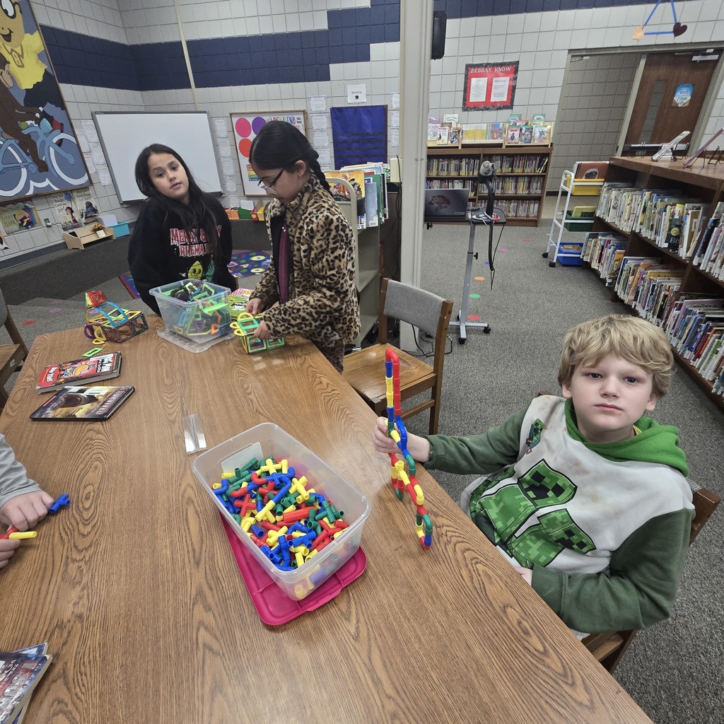 students building a machine to make it snow