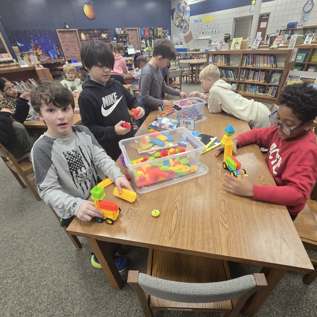 students building a machine to make it snow