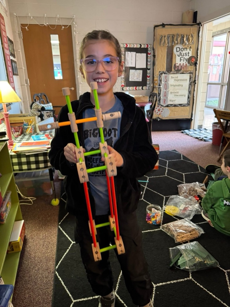 student playing with manipulatives 
