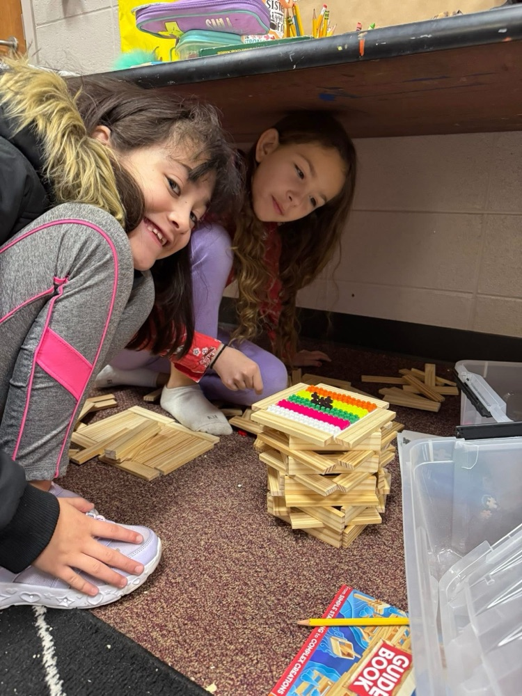 student playing with manipulatives 