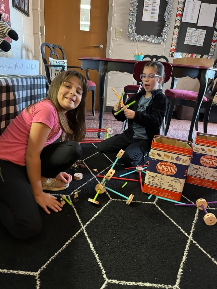 student playing with manipulatives 