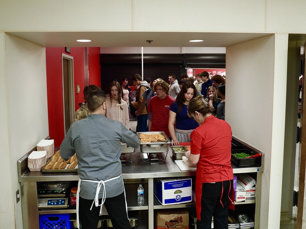Chef Ryan serving high school students. 
