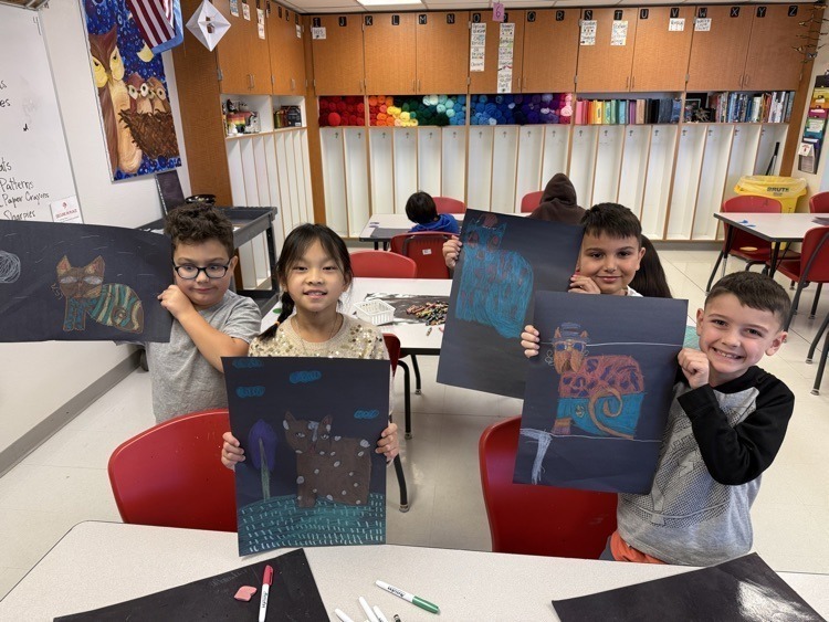 Catalaya students with their art work