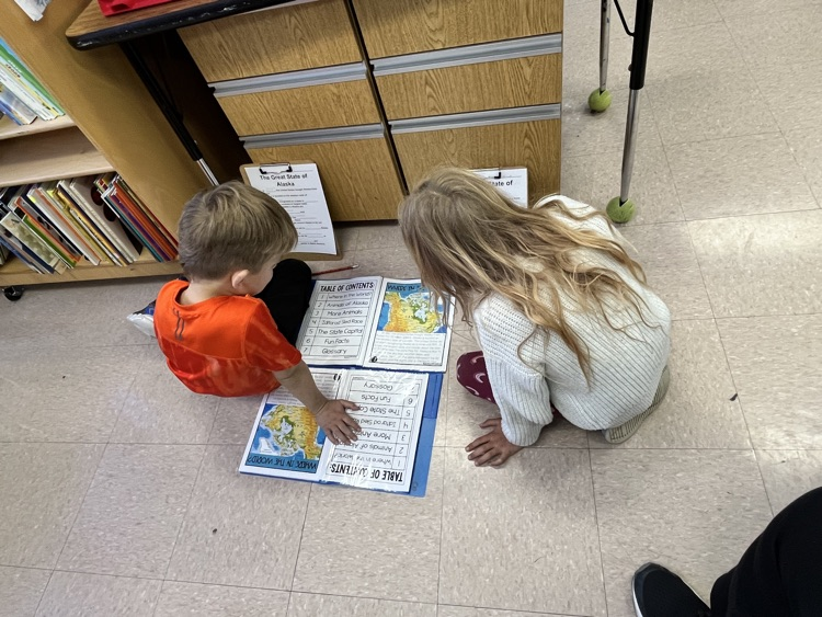 students working on Alaska text 