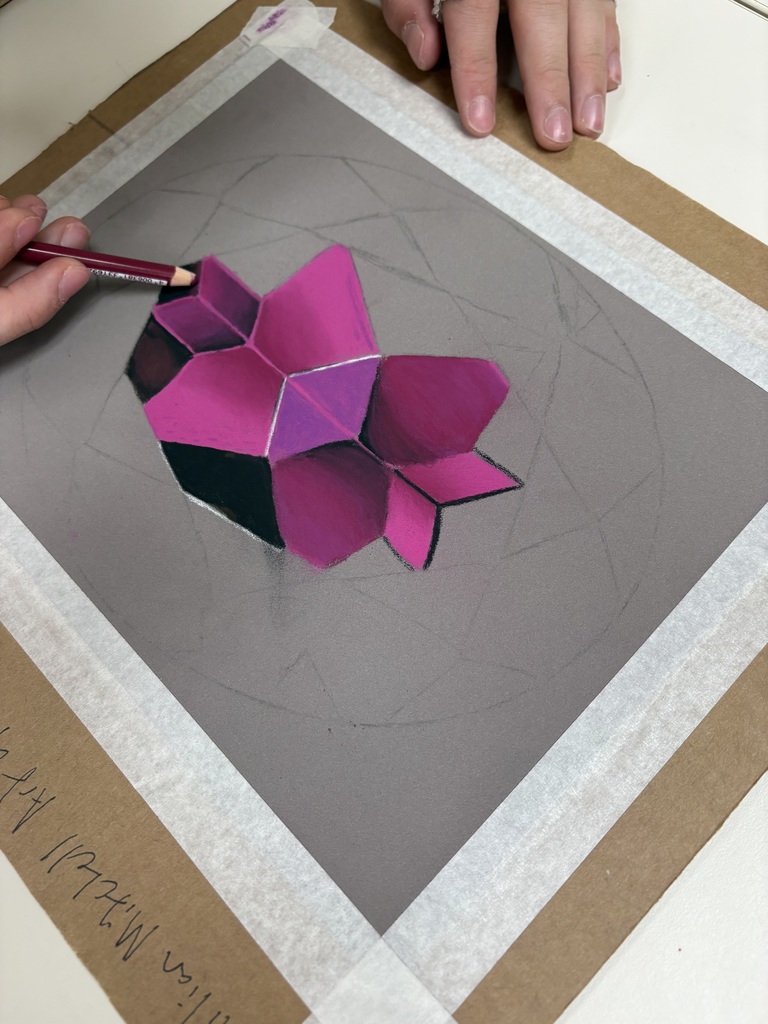 Art 1 students are diving into colored pencil techniques with dazzling gemstone drawings! From smooth blending to bold highlights, their shading skills are shining through. Advanced students pushed themselves even further by working with pastel pencils for the first time. This marks the first realistic, full-color drawing of the semester—and their growth is seriously blowing us away!