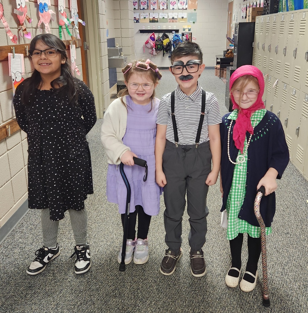 students smiling and posing