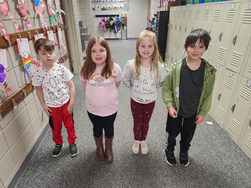 students smiling and posing