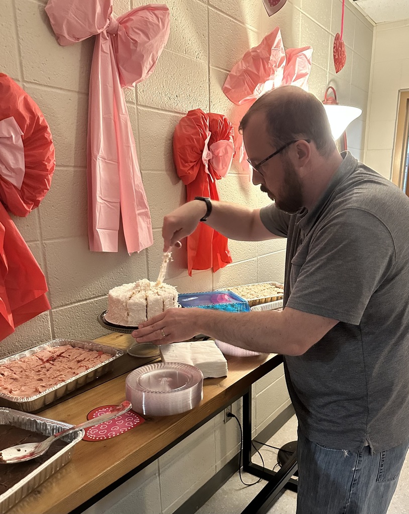 fbc staff cutting cake