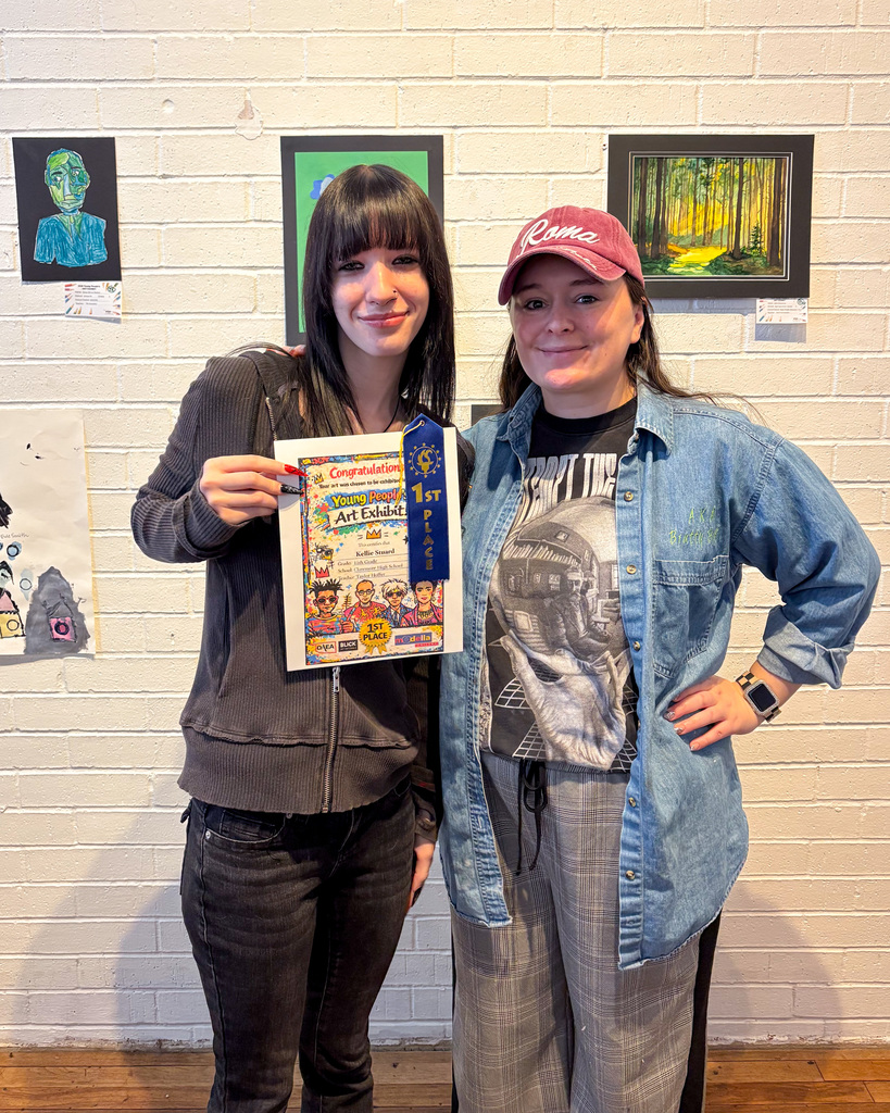 Kellie and Miss Hoffer at art show.