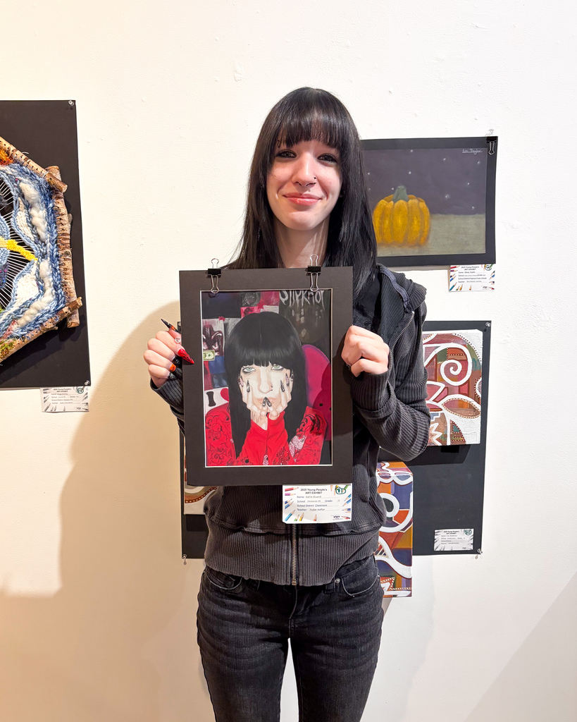 Kellie with her award winning artwork