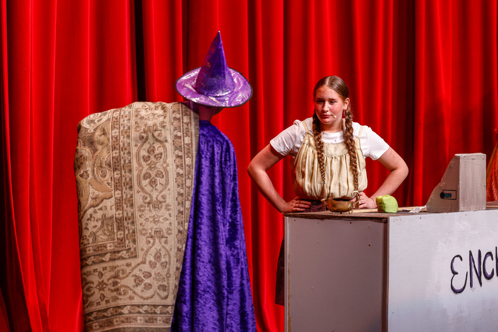 Junior high students performing during the play
