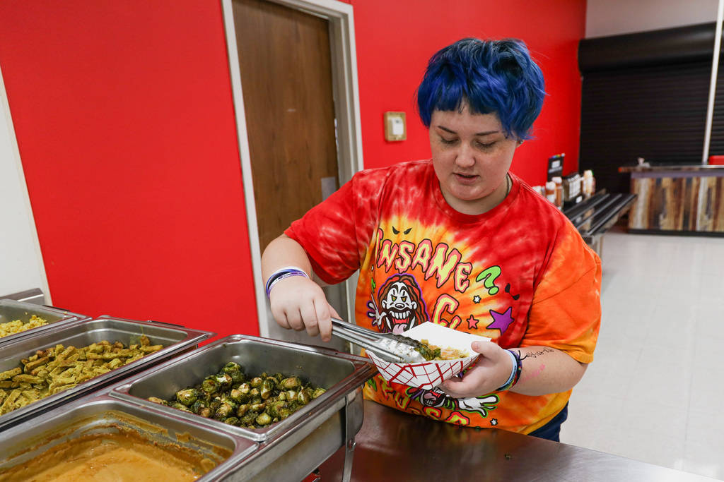 High school student self serving during lunch