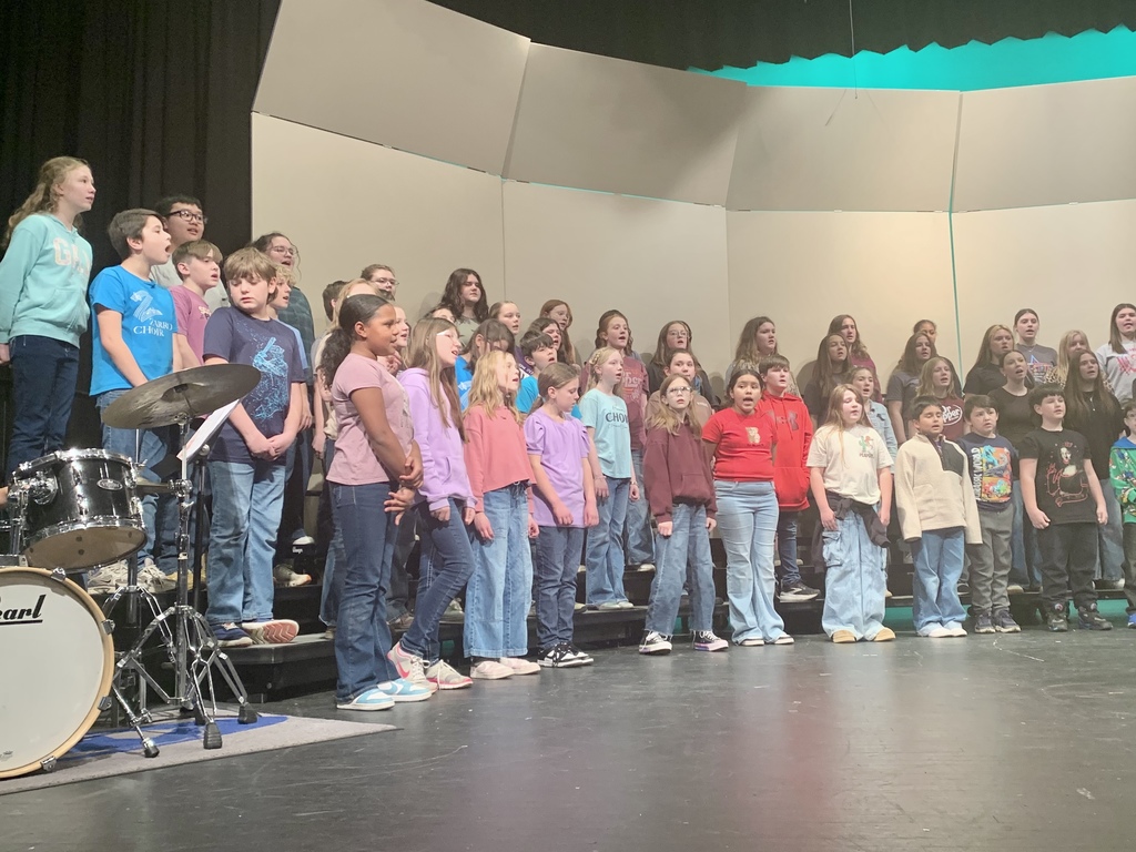 Students on stage performing at Circle the State