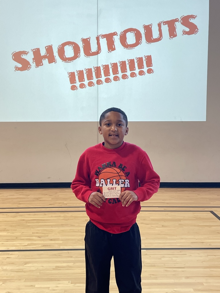 student holding a shoutout