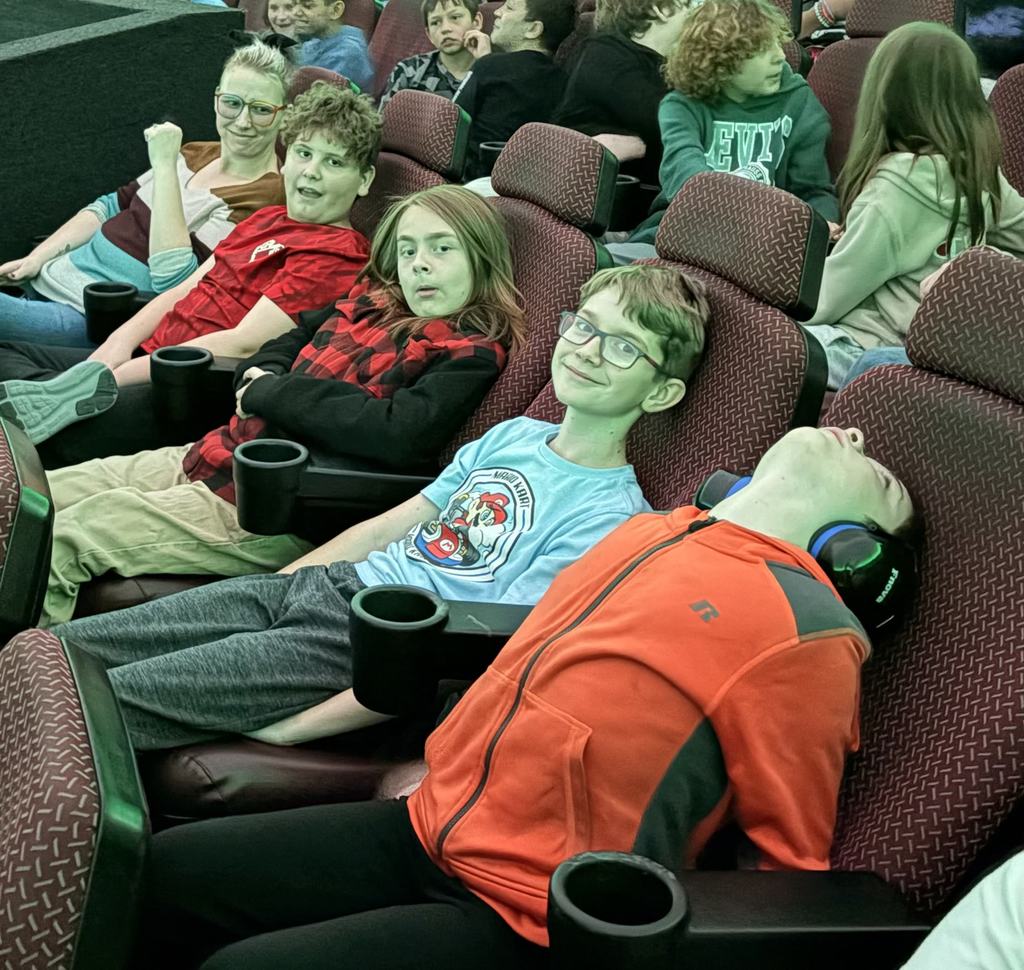 students smiling during presentation