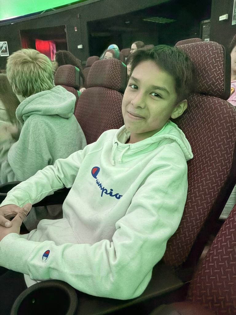 students smiling during presentation