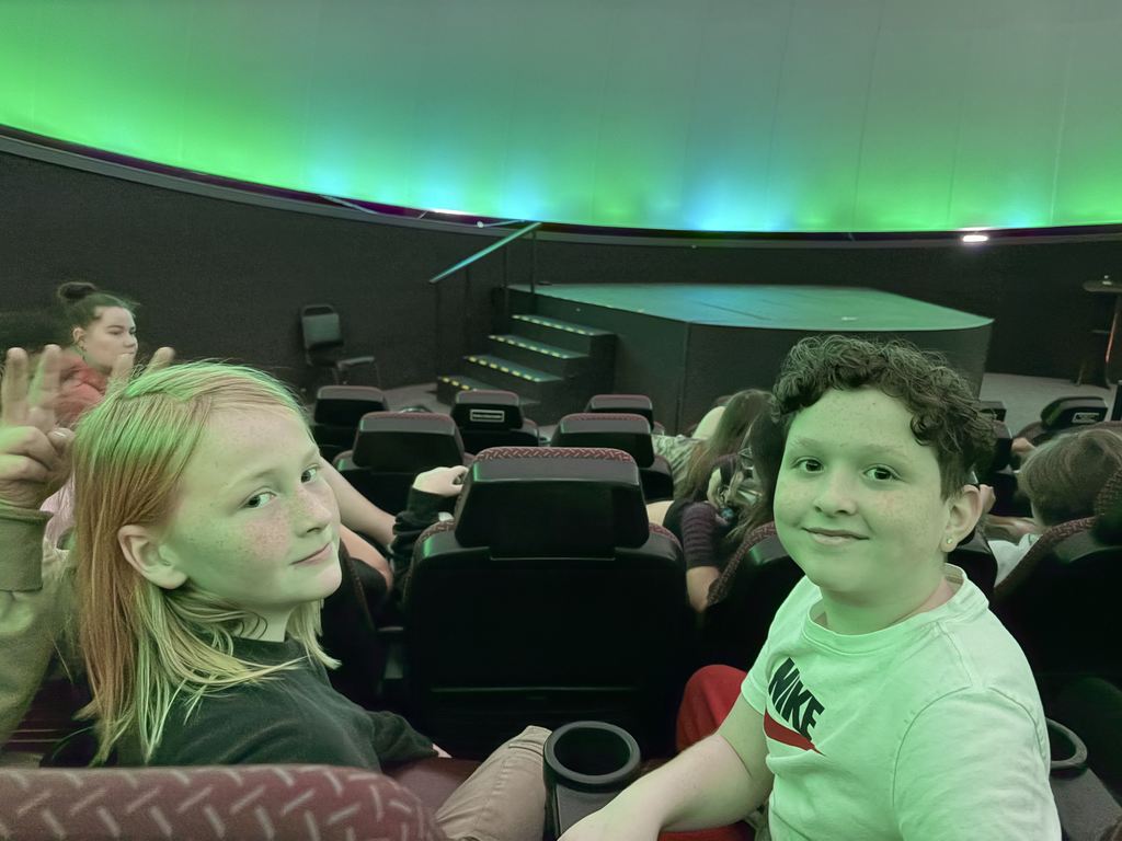 students smiling during presentation