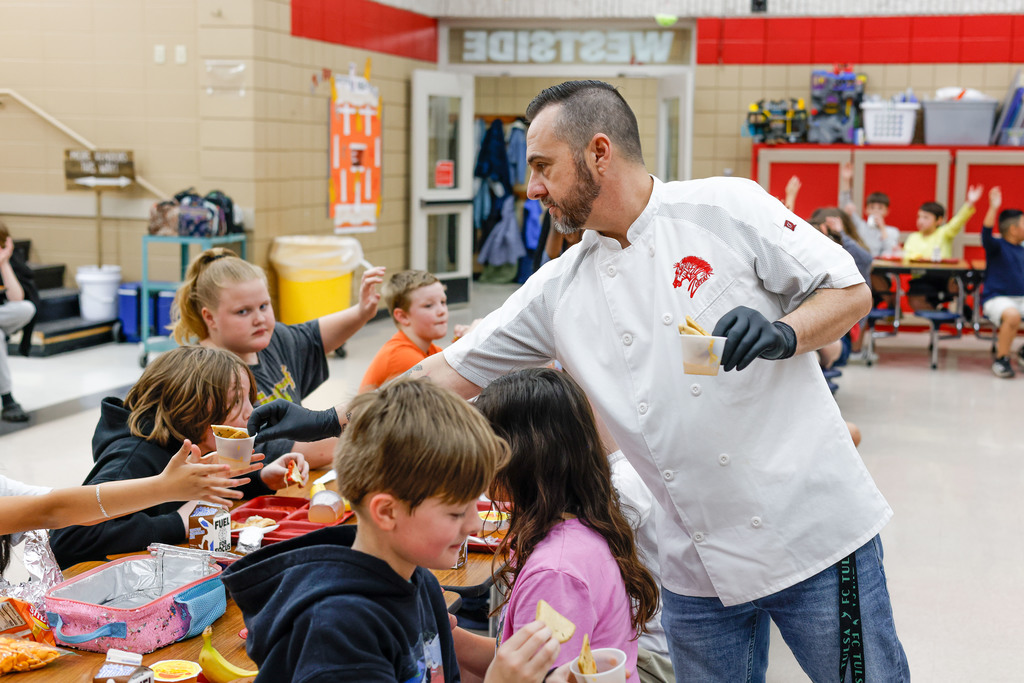 Chef Ryan serving Westside Elementary students.