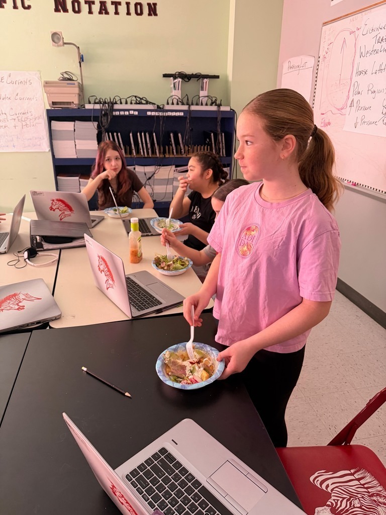 junior high students learning about growing plants.