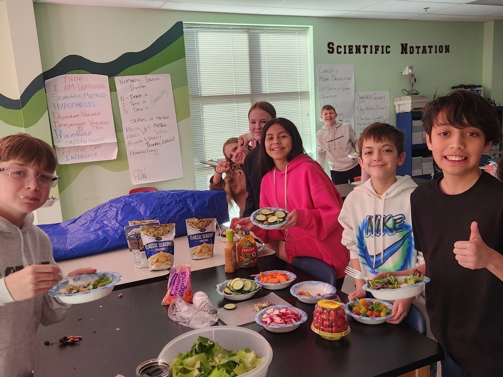 junior high students learning about growing plants.