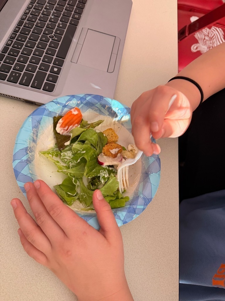 junior high students learning about growing plants.