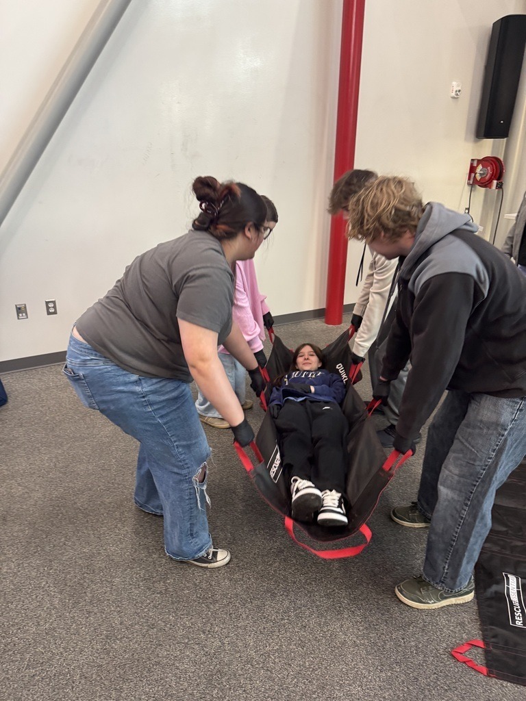 Claremore High School BioMed students doing hands on work.