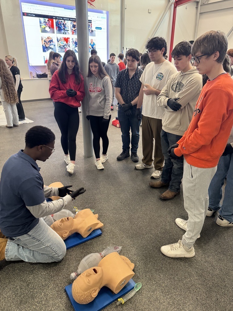 Claremore High School BioMed students doing hands on work.