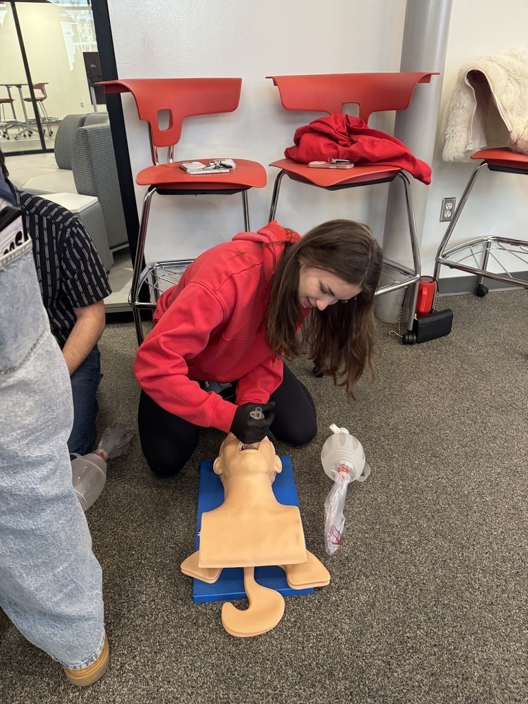 Claremore High School BioMed students doing hands on work.