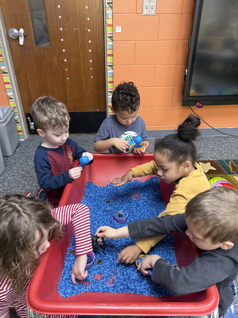 students playing in texture to help beads
