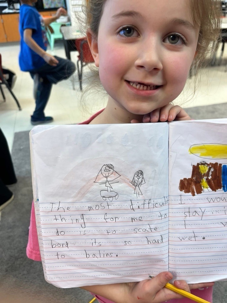 students with their writing assignment 