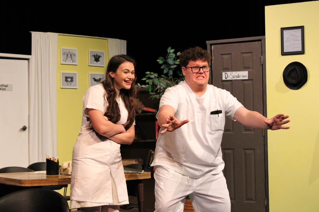 Students acting in the CHS play Harvey