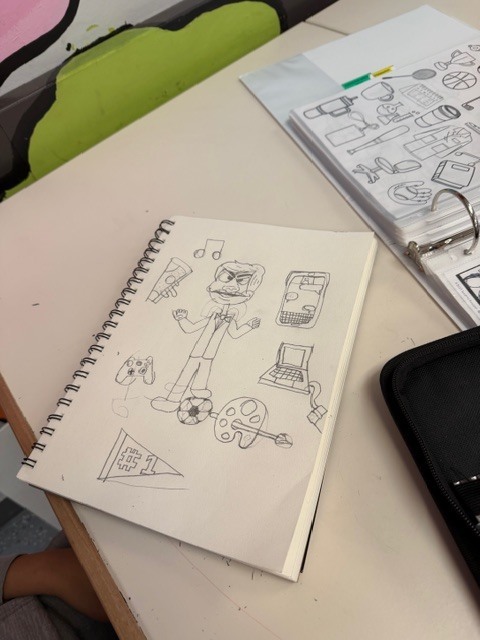 Student drawing another student and their interests 