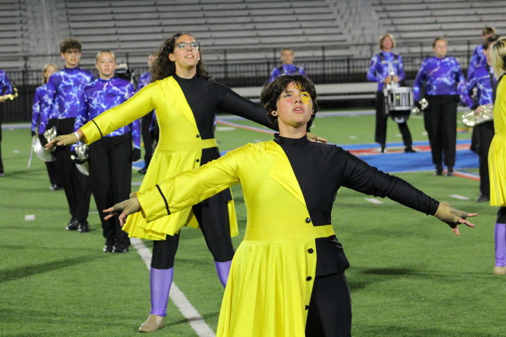 Zebra Band and Guard on the field during a show