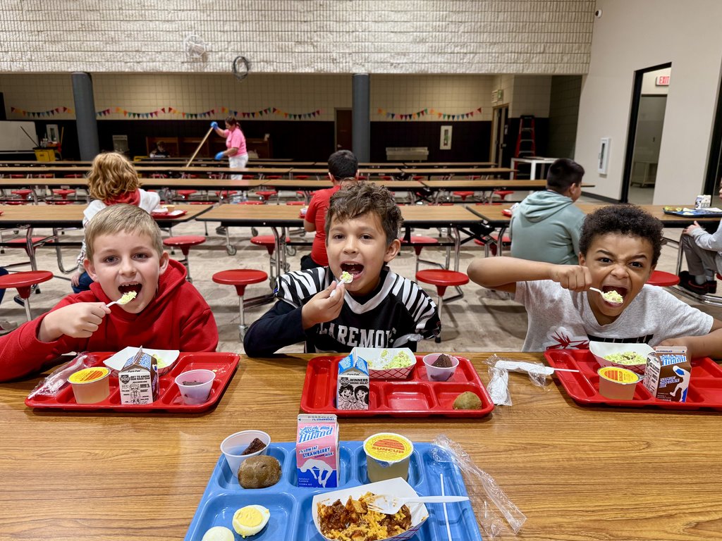 Students eating green eggs and ham