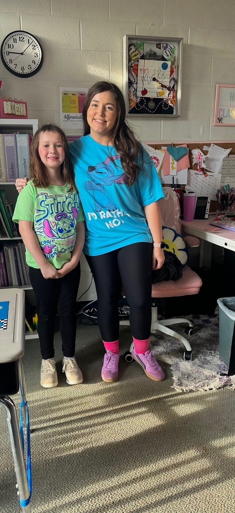 Student and staff dressed as staff and student